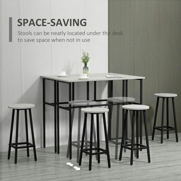 Grey bar table with four round stools positioned tucked under the table for space saving