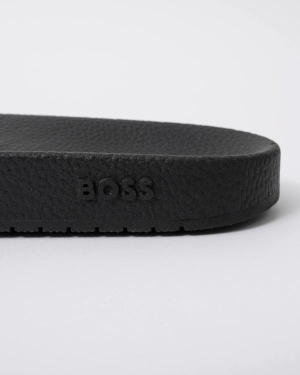 detail of BOSS Orange Aryeh Mens Italian-Made Slides With Large Logo Detail in Dark Blue 406