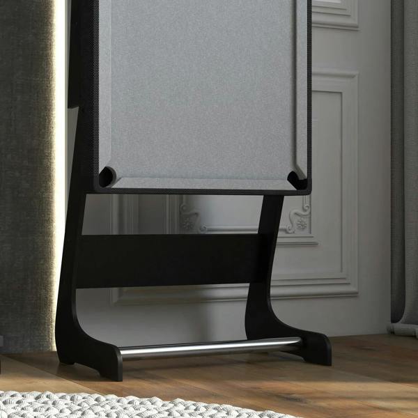 Folded grey pool table base with black frame and silver leg tube near a wall.