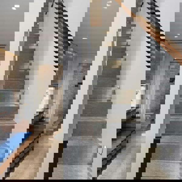 silver lights for staircase wall mounted alongside a modern staircase