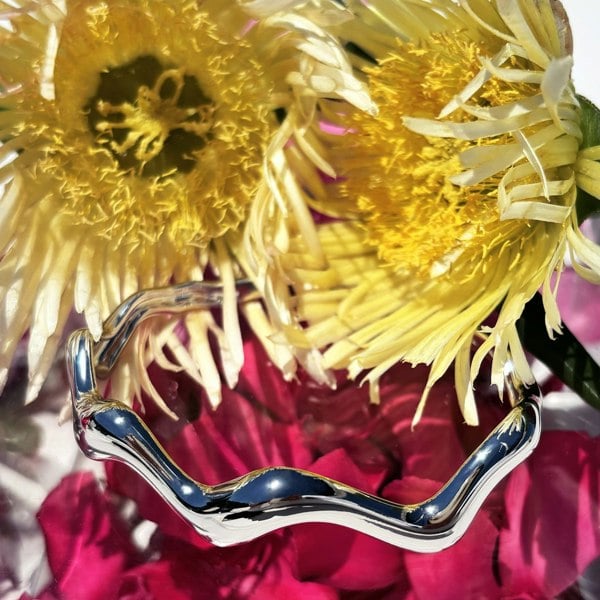 Liquid bracelet by LENAE London, sculptural sterling silver cuff.