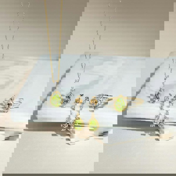 classic-pear-peridot-diamond-ring-in-9ct-yellow-gold-135r2139039 Flatlay