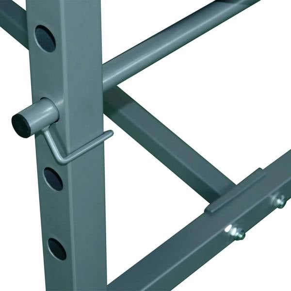 Steel barbell rack uprights with multiple hole positions and safety pegs