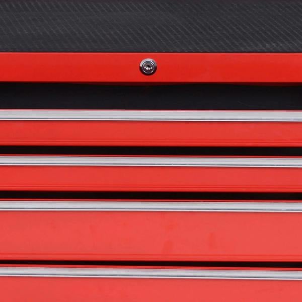 Close-up of red drawer fronts with chrome slide rails on tool cabinet