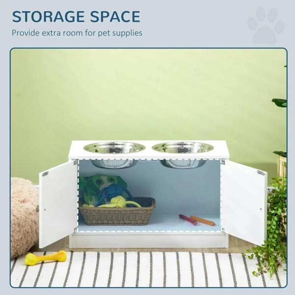 White raised pet feeder with two stainless steel bowls and open storage compartment