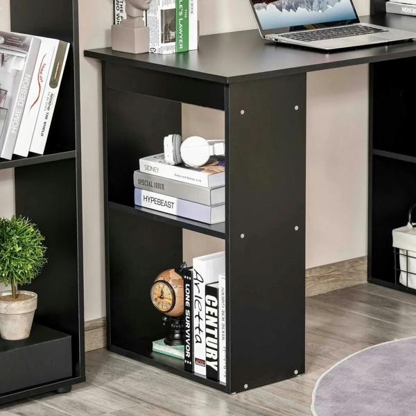Black desk storage compartment with books, decor, and open cubby shelves