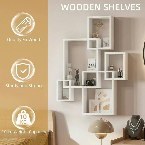 White wall-mounted cube shelves with open square cubbies for books and decor