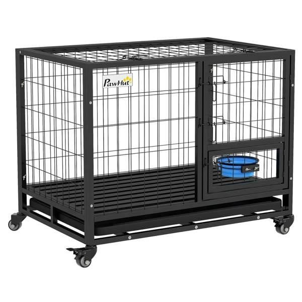 Black metal dog crate on wheels with open front door and blue bowl on tray