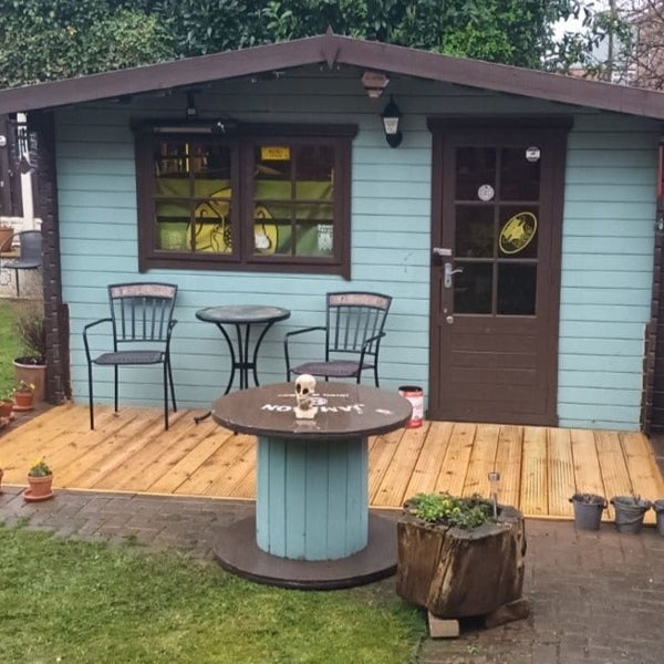 Outdoor cabin with seating area