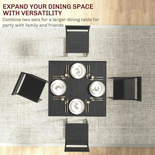 Black rectangular dining table with two matching chairs, top-down layout
