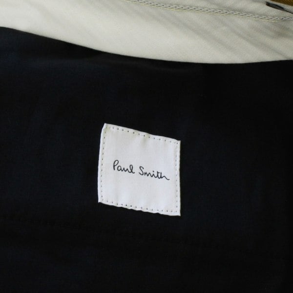 Paul Smith wide leg trousers in a burnt ochre tone twill wool fabric