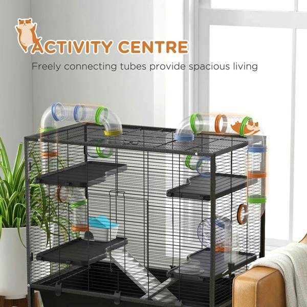 Large black hamster cage with attached tubes, multi-level platforms, and wheel