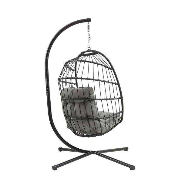Black rattan hanging egg chair with a cushioned gray seat, suspended from a sturdy metal frame, perfect for indoor or outdoor relaxation