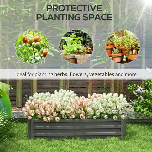 Light grey raised garden bed filled with tulips and other flowering plants