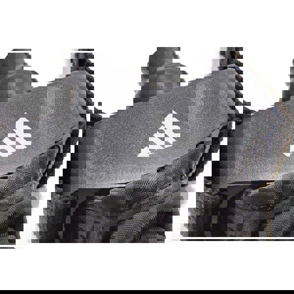 Close-up of a black Adidas L2 power tube with a white logo on a white background