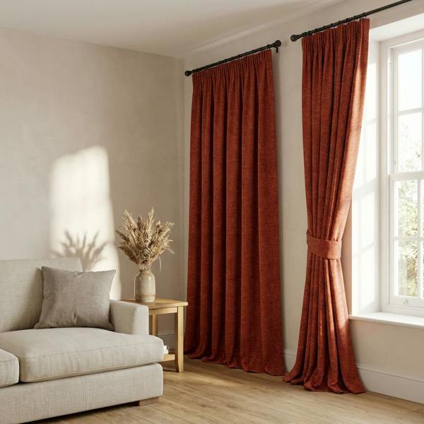 Toulouse made-to-measure curtains in Auburn, styled in a living room