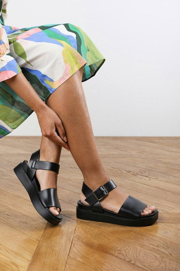 Where's That From Teresa Footbed Flatform Sandals in Black Faux Leather