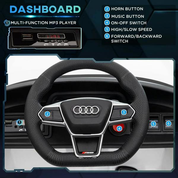 Black textured steering wheel and dashboard buttons inside a white kids ride-on car
