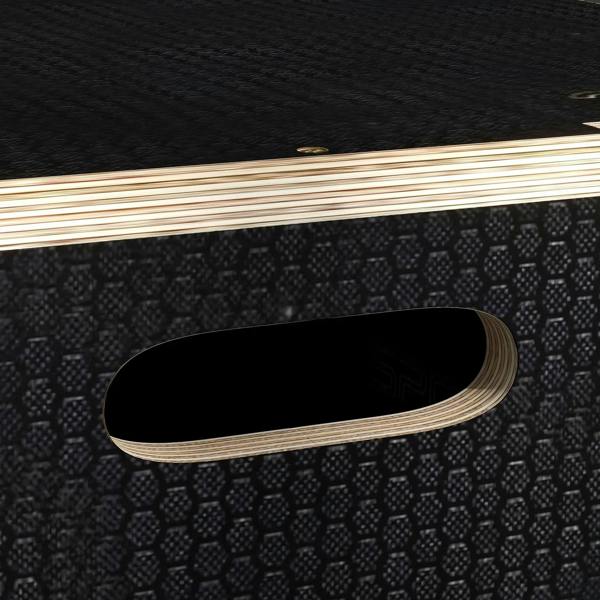 Black wooden jump box top carry handle slot with light wood frame