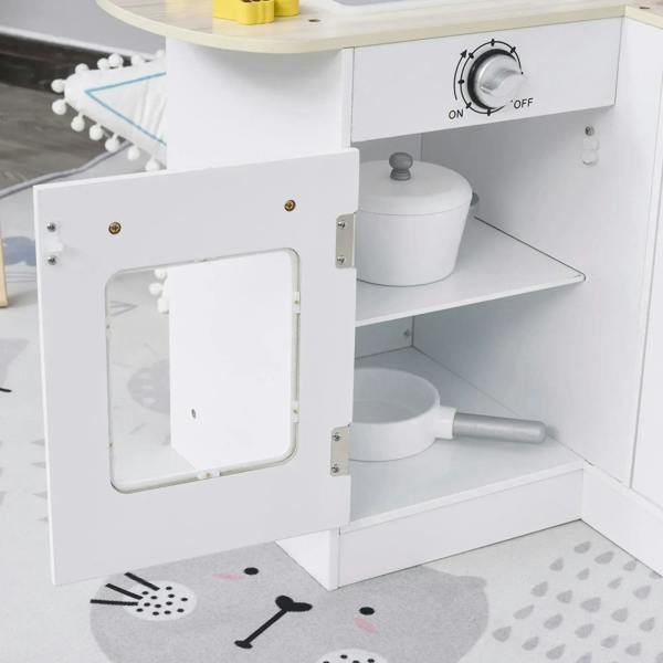 White play kitchen open cabinet door with storage shelves and countertop switch area