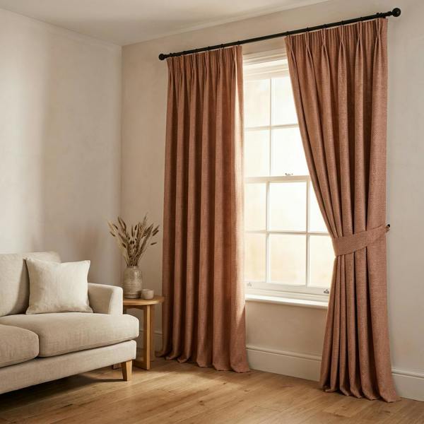 Madrid made-to-measure curtains in Terracotta, styled in a living room