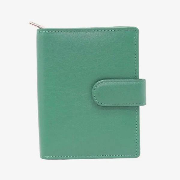 Green leather purse with a strap on a white background