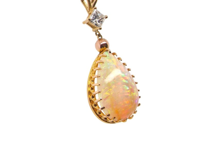 Vintage Tom A fine Opal and Diamond Pendant