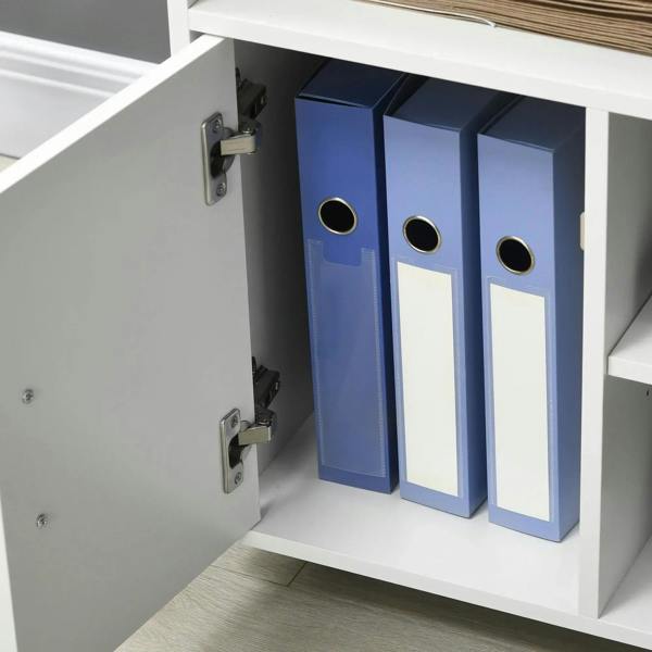 Open white cabinet shelf holding blue and white file binders