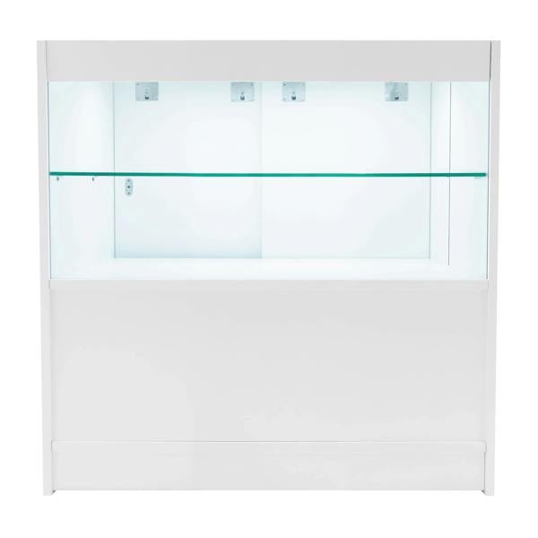 Andromeda LED shop counter set in white, featuring a sleek design with glass shelves and integrated lighting for display purposes