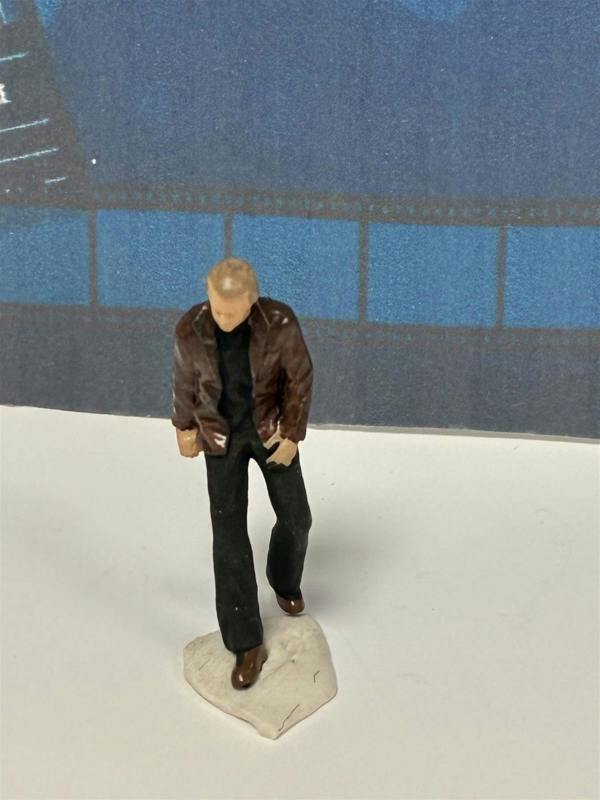 a small figurine of a man