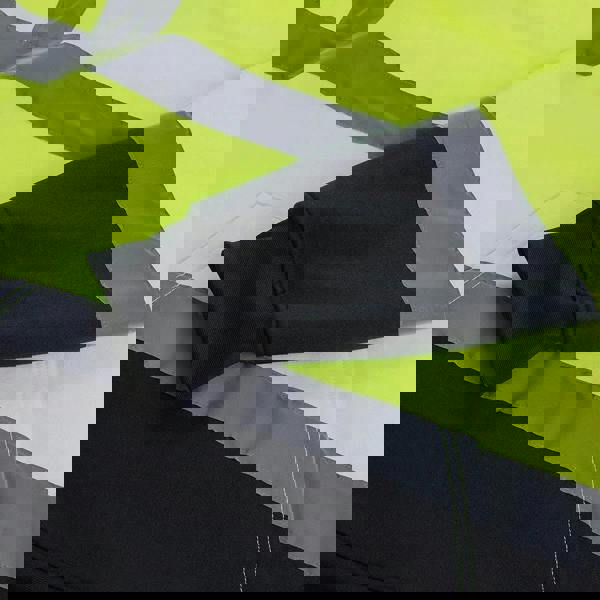 Scruffs High Visibility Mens Hi-Viz Work Pull Over Hoodie, close-up of the black hoodie with high visibility yellow and gray reflective strips.