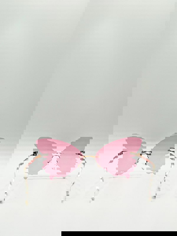 SVNX Frameless pink butterfly sunglasses