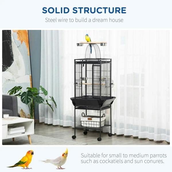 Freestanding dark grey bird cage with arched open top and sturdy metal frame