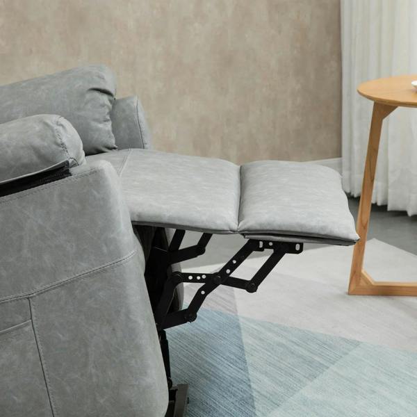 Grey recliner chair shown reclined with extended footrest and lift base