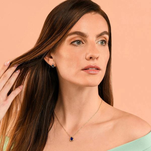 Zavana Gold Plated Blue Bezel Set Stud Earrings with Pear-Shaped Blue Cubic Zirconia Stones