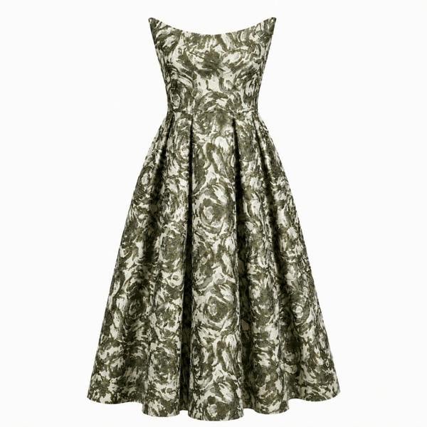 The Tala Corset Midi Dress by Sarvin features a sleeveless, fitted bodice and flared skirt with an abstract green and white floral print. A slightly off-the-shoulder neckline adds structure to this elegant midi silhouette.