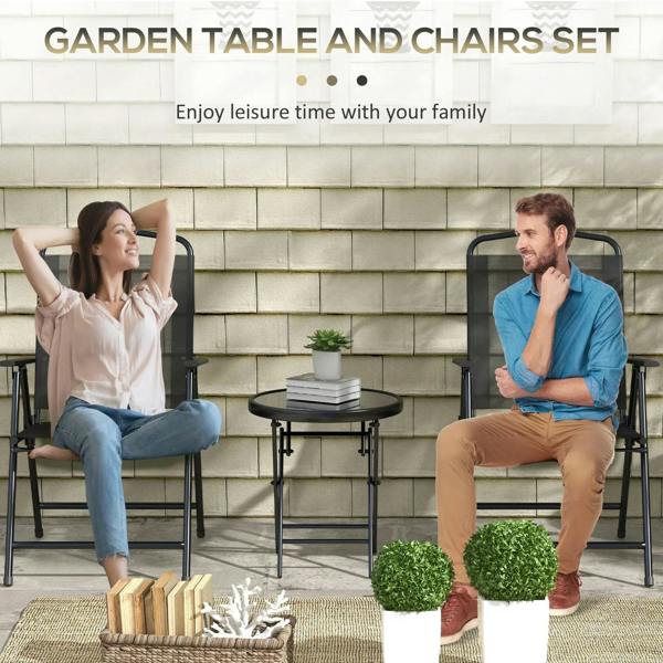 Black patio chairs with mesh backs and a round glass-top table