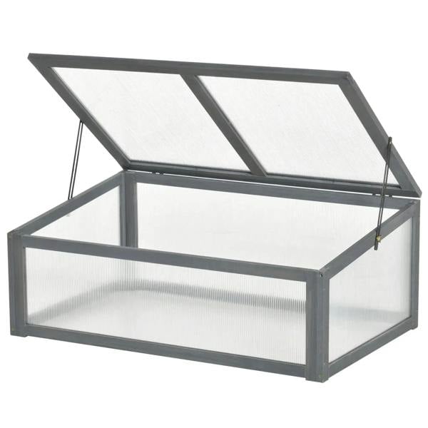 Small grey cold frame greenhouse with clear polycarbonate panels and openable tilted lid