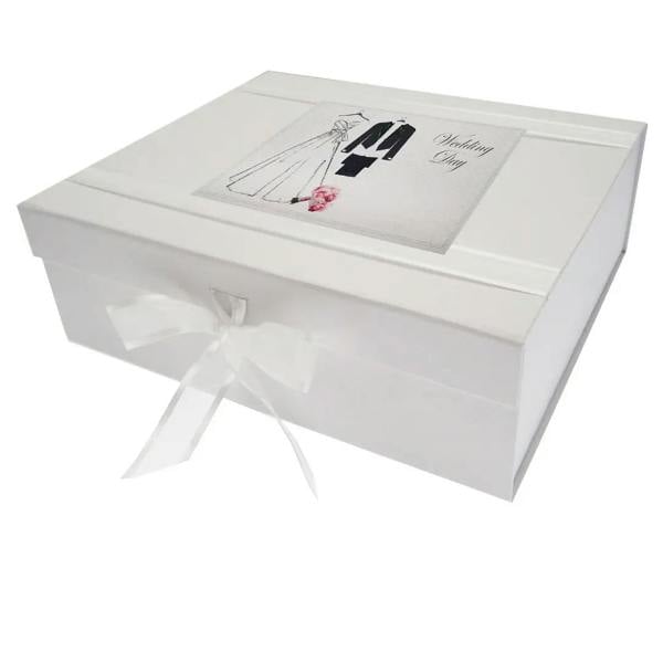 Large white 'Bride and Groom' wedding keepsake box featuring an illustration of a wedding dress and suit, handmade in England with a white organza ribbon tie.