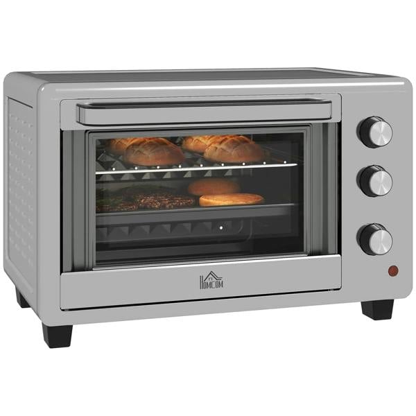 Silver mini electric oven with open door and heating interior, three control knobs