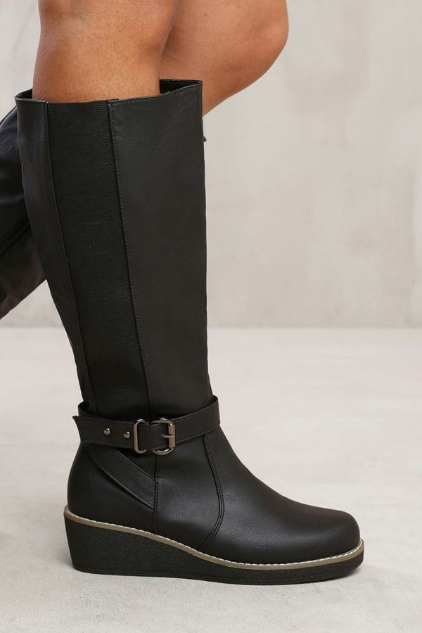 Where's That From Vanda Wedge Heel Knee High Boots With Elastic Panel in Black