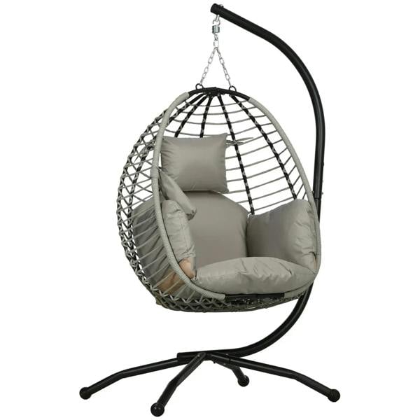 Grey hanging egg chair with rattan-style woven shell and padded seat cushion