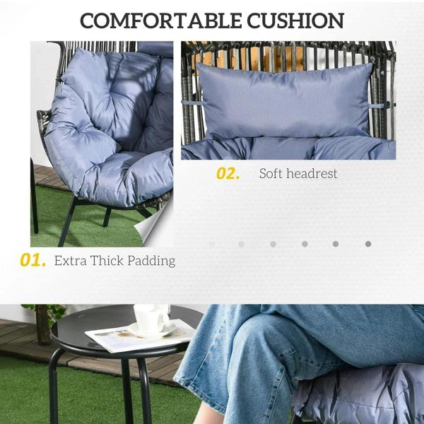 Egg chair cushion detail: thick light grey-blue padding with headrest