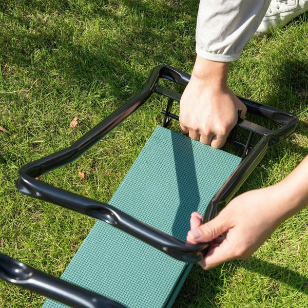 Garden kneeler seat folding with dark green padded surface and black metal handles