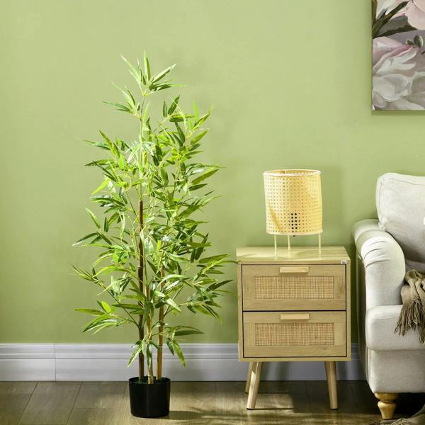 Artificial bamboo plant in black pot with green stalks and leaves for home decor