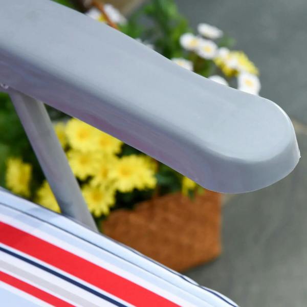 Striped lounger cushion detail with red, white, and blue fabric and padded trim