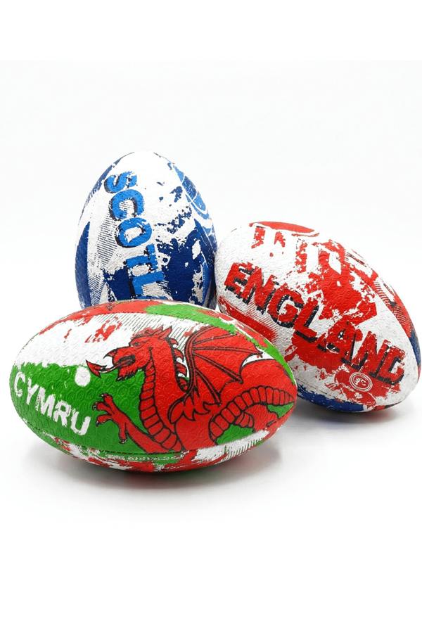 Three Optimum rugby balls printed Scotland, England and Wales Cymru with dragon graphic, on white - Optimum