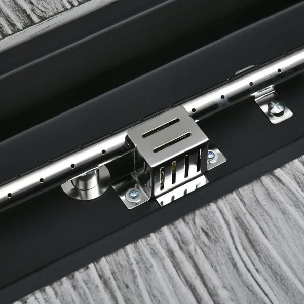 Burner and ignition control components inside grey gas fire pit table