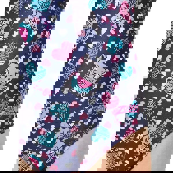 Zoggs Tots Girls Kitty Actionback swimsuit in navy blue with cat, yarn, and colorful hearts