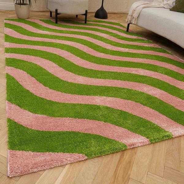 Wavy patterned fabric with green and pink wavy lines